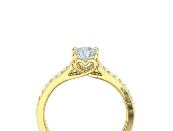 Yellow gold solitaire engagement ring